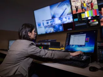 Woman in broadcast studio